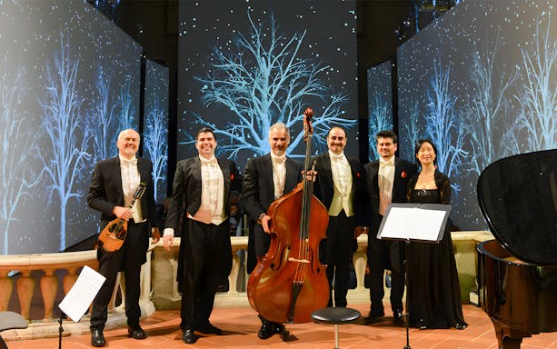 Musicians with instruments on stage for Tuscan Dinner and Three Tenors Concert in Florence.