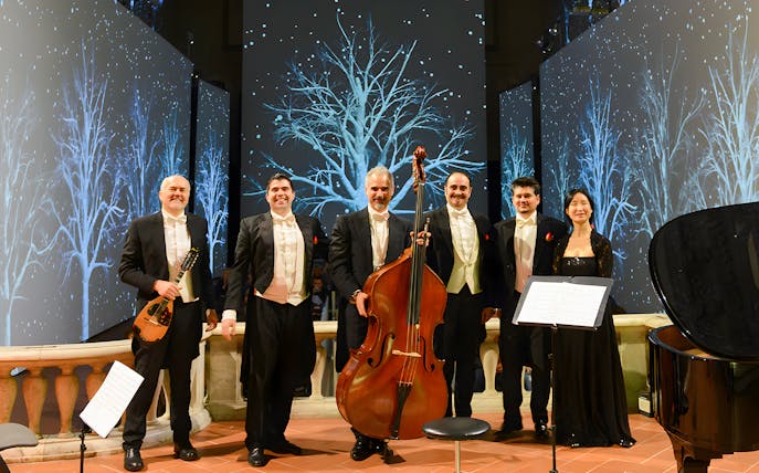 Musicians with instruments on stage for Tuscan Dinner and Three Tenors Concert in Florence.