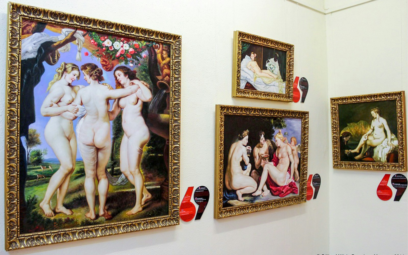 Paintings of nude figures displayed at the Erotic Museum in Barcelona.