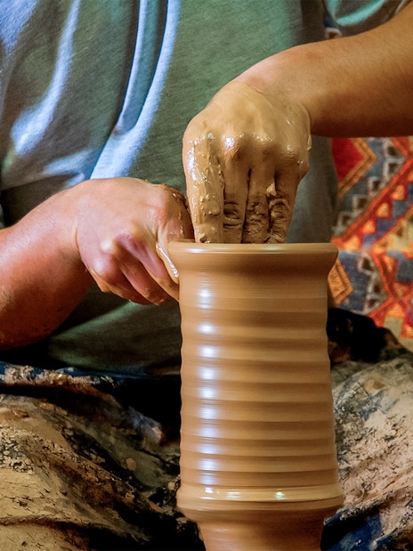 Potter shaping clay on a wheel in Avanos, Cappadocia.