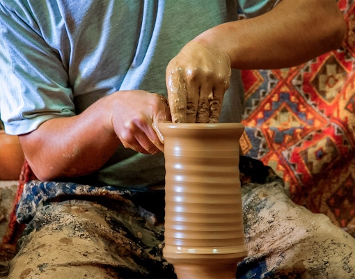 Potter shaping clay on a wheel in Avanos, Cappadocia.