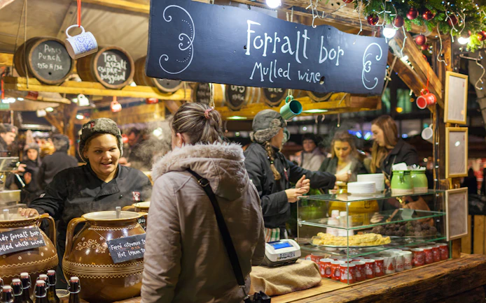 Mulled wine stall at a Christmas market during the Christmas Lights Tour.