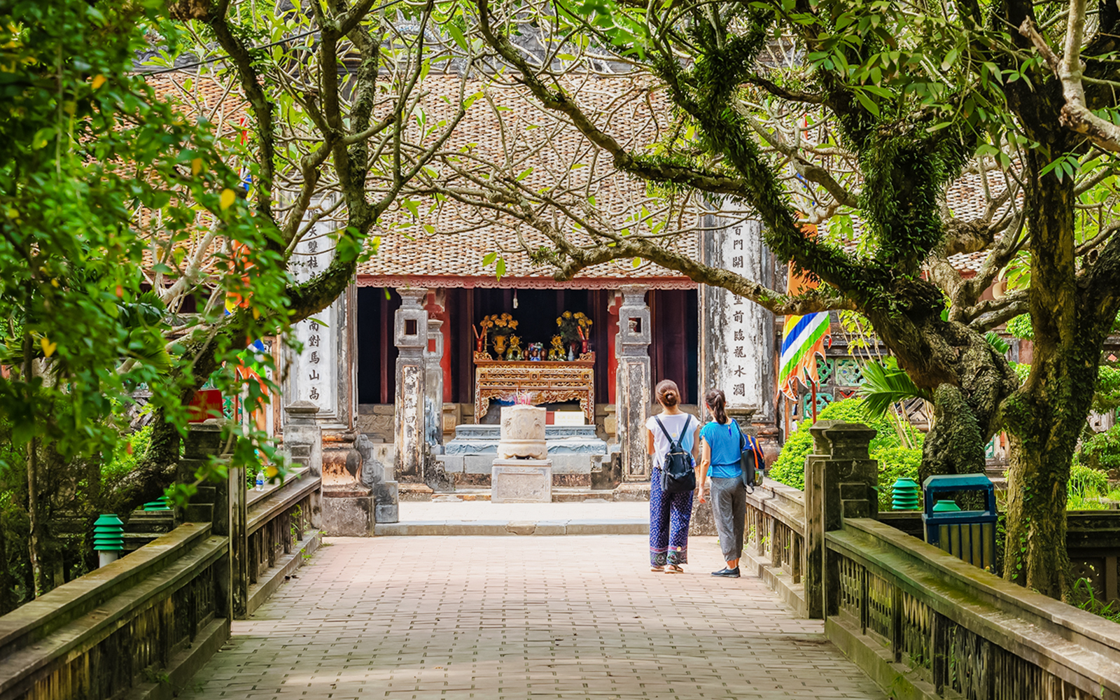 Entrance to Hoa Lư Ancient Capital with visitors in Ninh Bình, Vietnam.