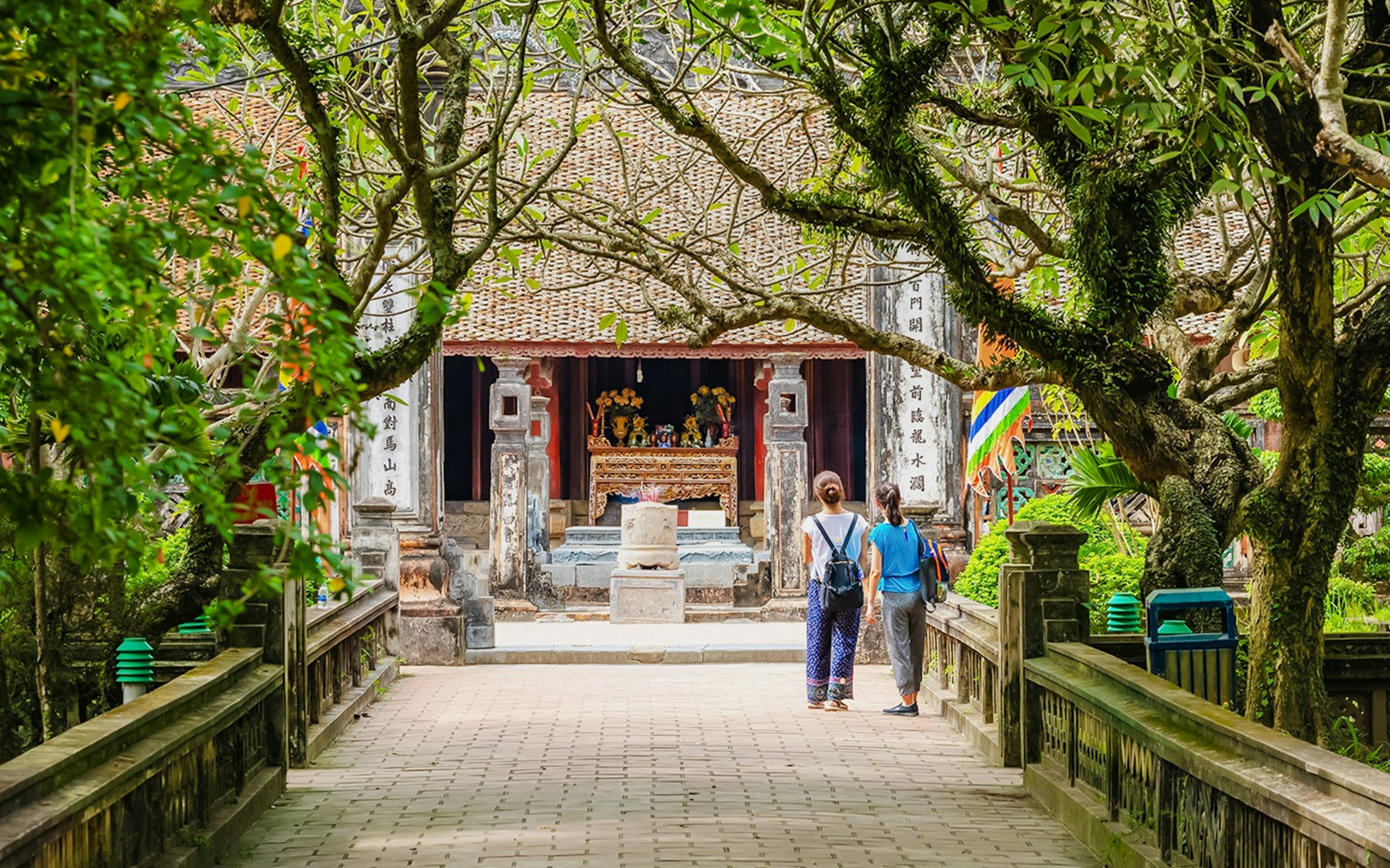Entrance to Hoa Lư Ancient Capital with visitors in Ninh Bình, Vietnam.
