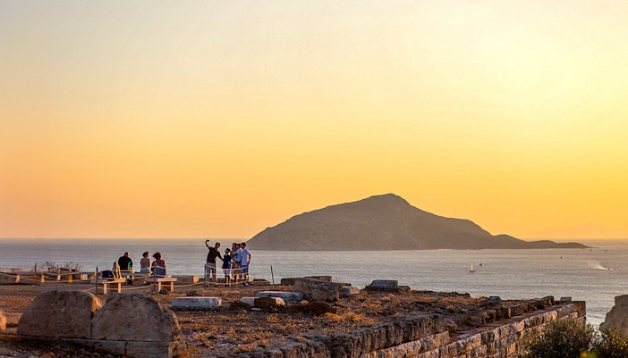 Tourist taking selfie in Archaeological Site of Sounion