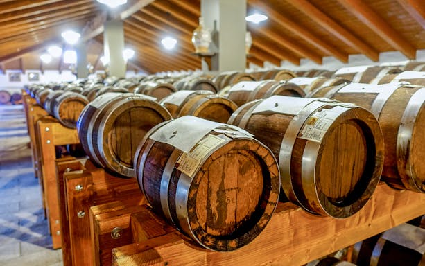 Barrels of balsamic vinegar aging at Acetaia La Vedetta in Modena.