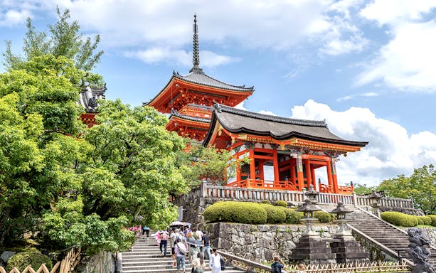 Kiyomizu-dera Temple with tourists on steps, Kyoto Full-day Bus Tour from Osaka.