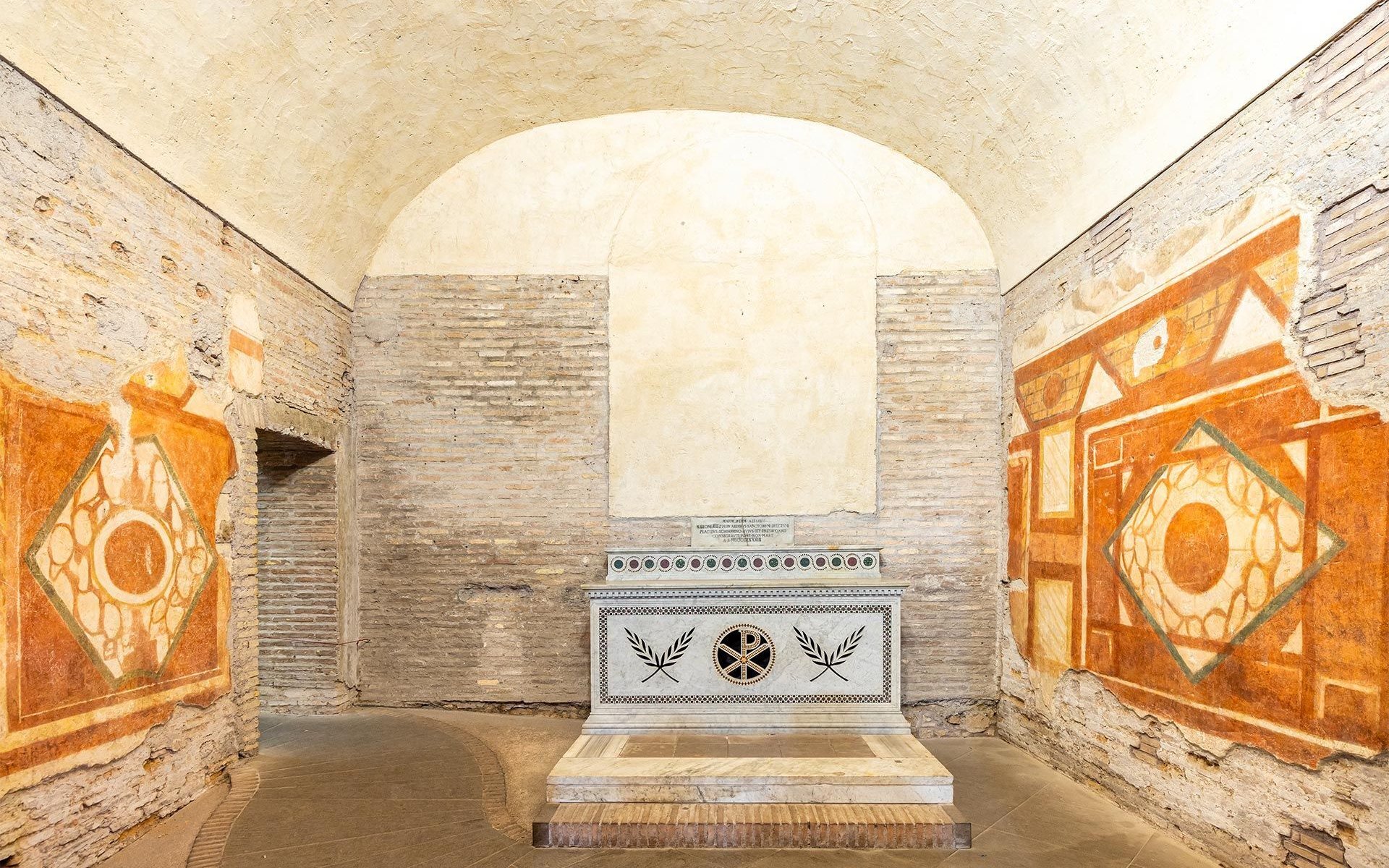 Roman Houses of the Celio Hill, ancient frescoes and altar in underground chamber, Rome.