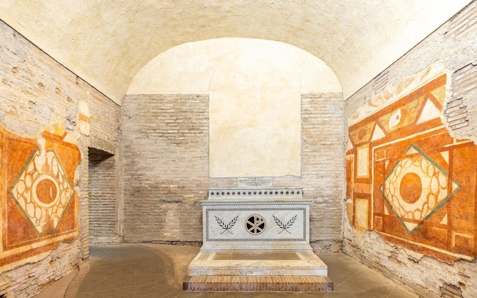 Roman Houses of the Celio Hill, ancient frescoes and altar in underground chamber, Rome.