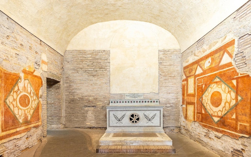 Roman Houses of the Celio Hill, ancient frescoes and altar in underground chamber, Rome.