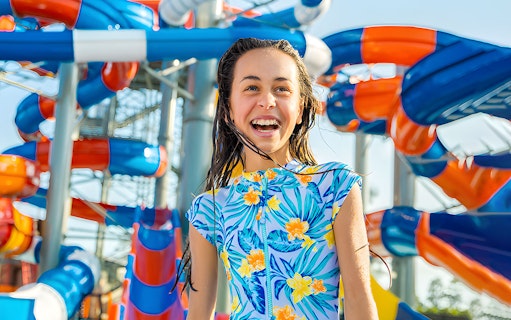 Child enjoying water slides at WhiteWater World, Gold Coast.