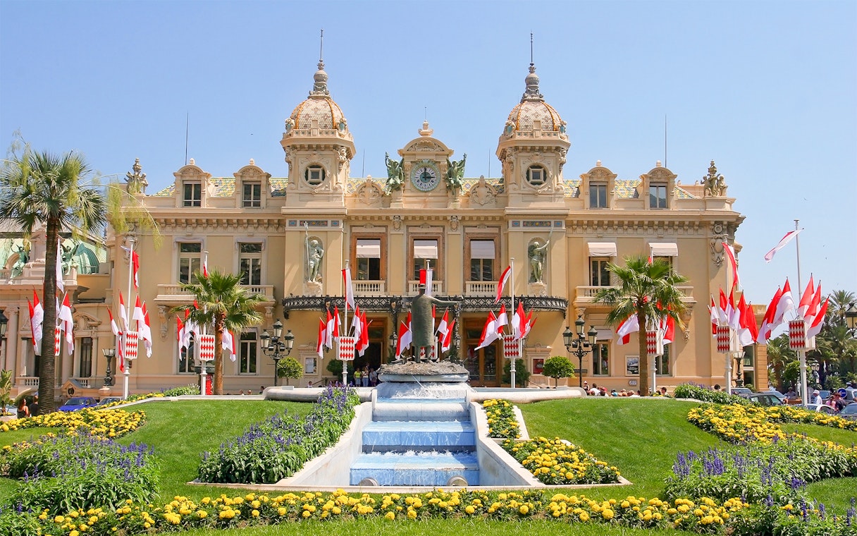 Monaco Casino with gardens and fountain, viewed from Nice.
