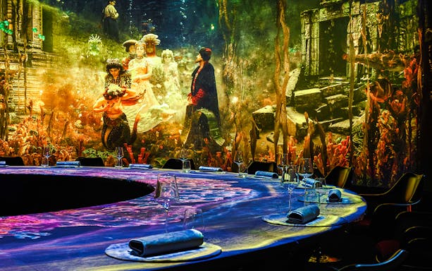 Immersive art installation at IMAGINARY ART show, KRASOTA Dubai, featuring a vibrant underwater scene.