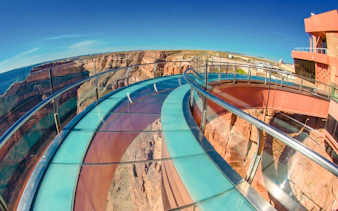 Grand Canyon Skywalk with glass bridge overlooking canyon landscape.