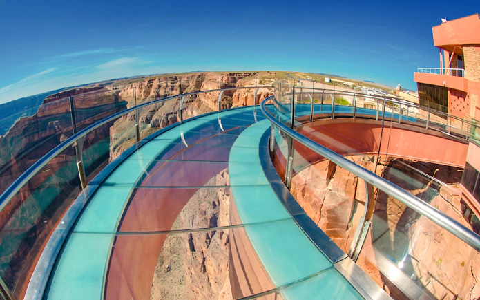 Grand Canyon Skywalk with glass bridge overlooking canyon landscape.