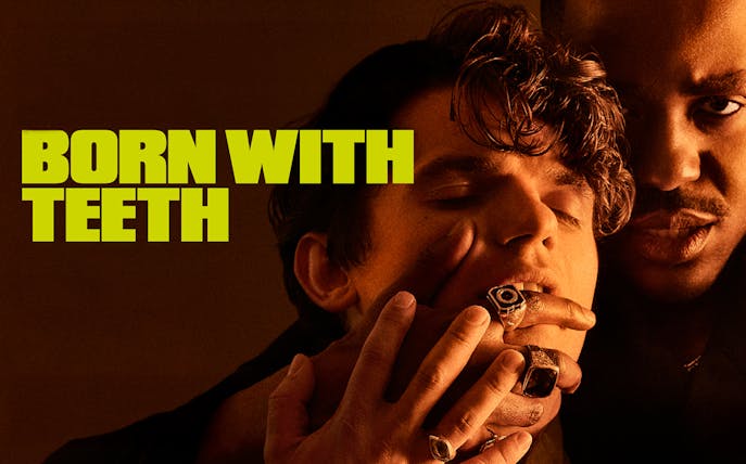 Born With Teeth" text with two people in close interaction.