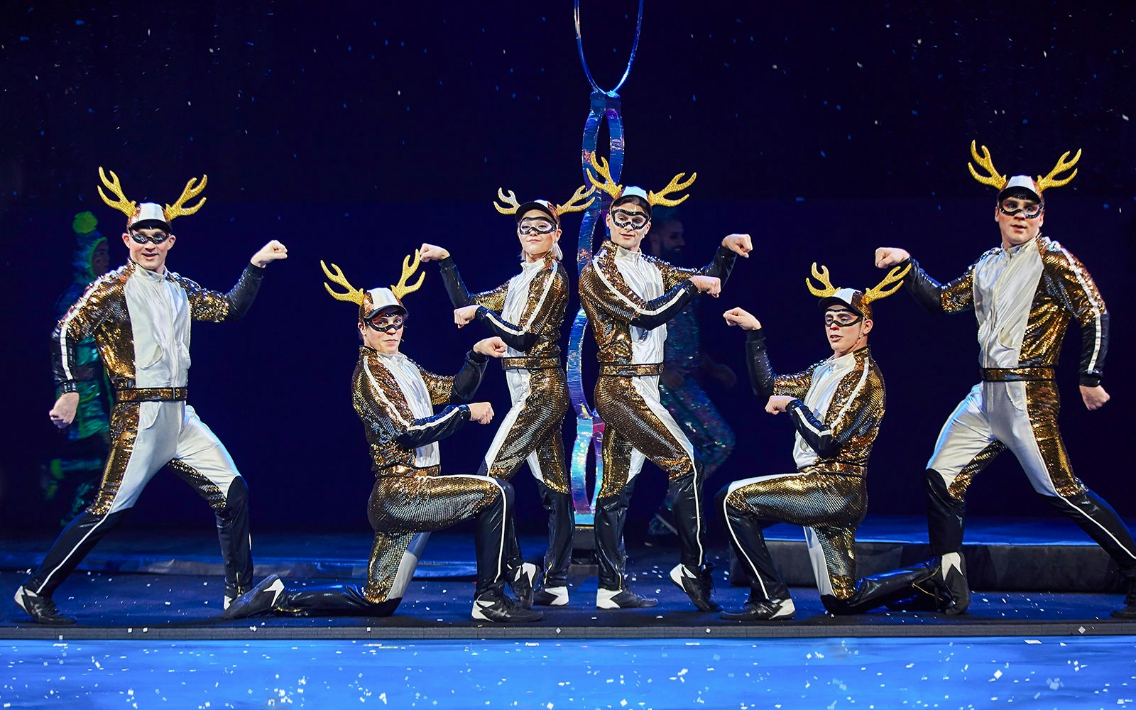 Performers in reindeer costumes during Cirque du Soleil's 'Twas The Night Before stage show.