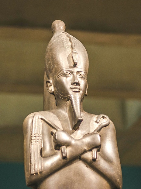 Statue of an ancient Egyptian pharaoh at the Egyptian Museum of Antiquities.