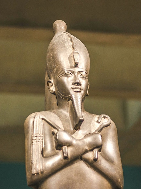 Statue of an ancient Egyptian pharaoh at the Egyptian Museum of Antiquities.