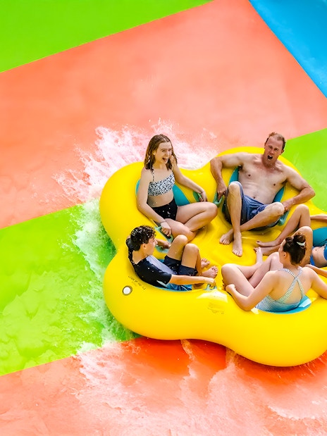Group enjoying a raft ride at Aquatica Orlando water park.