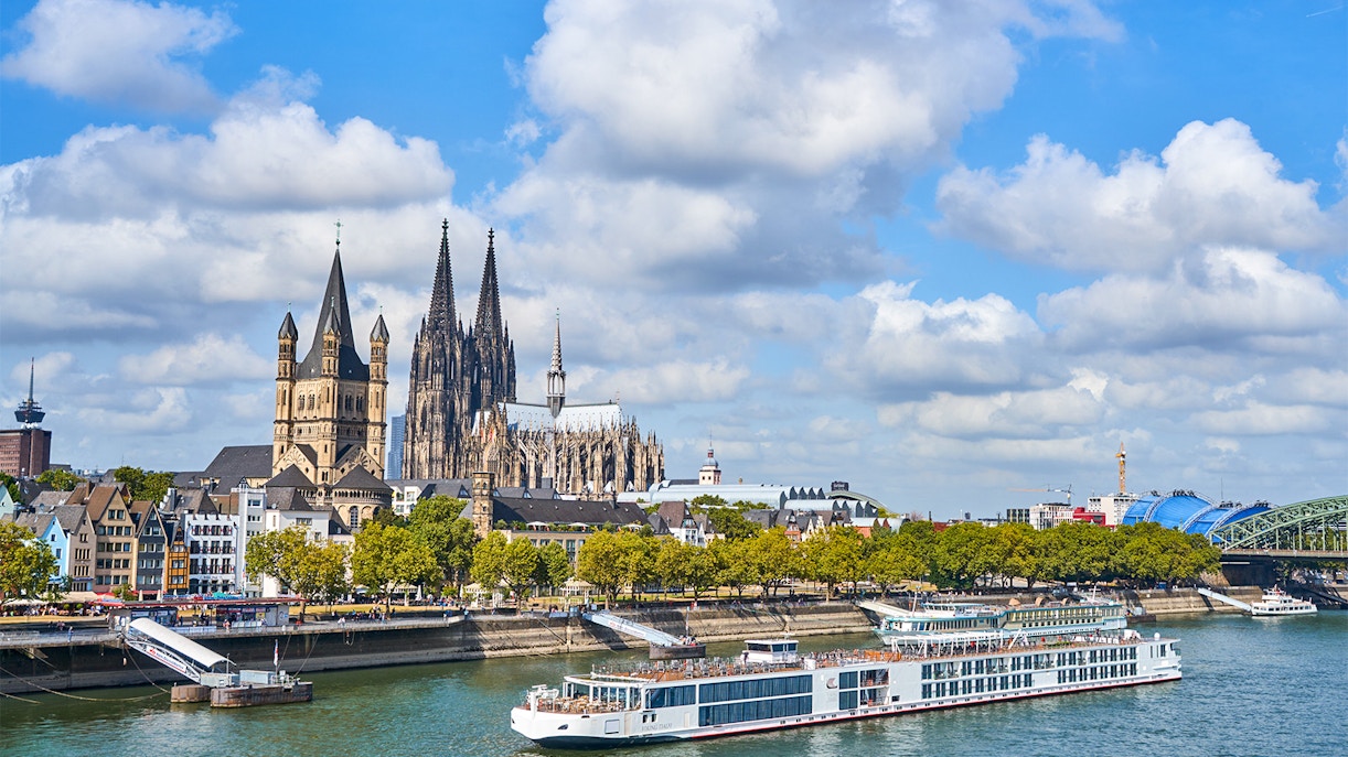 Cruise ship on the River Rhine with Cologne Cathedral in the background, Dusseldorf Cruises.