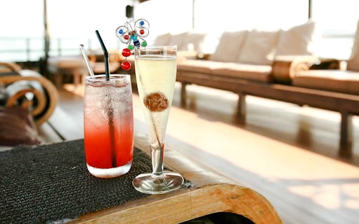 Champagne and cocktail on Aqua Luna cruise deck.
