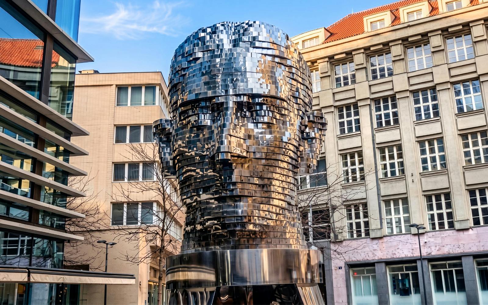 Rotating Kafka head sculpture near Franz Kafka Museum, Prague.