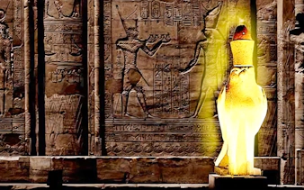 Edfu Temple hieroglyphs illuminated during Sound and Light Show.