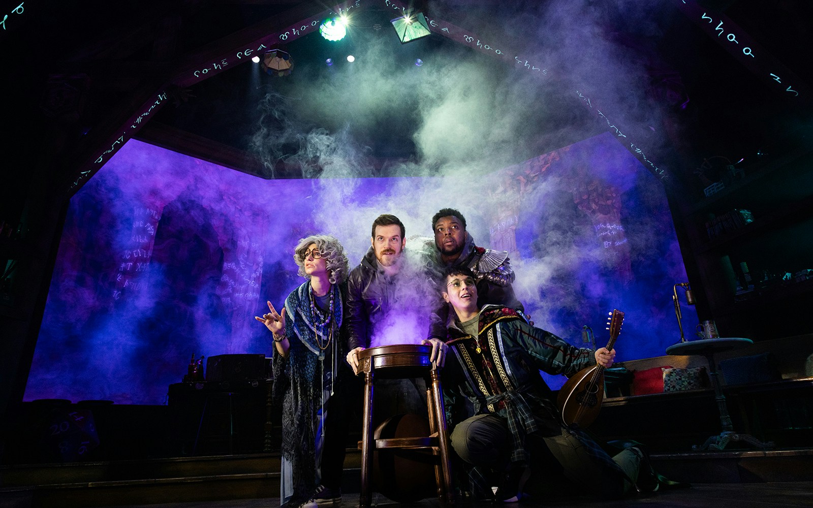 Actors in fantasy costumes perform in a smoky tavern setting for Dungeons & Dragons: The Twenty-Sided Tavern.