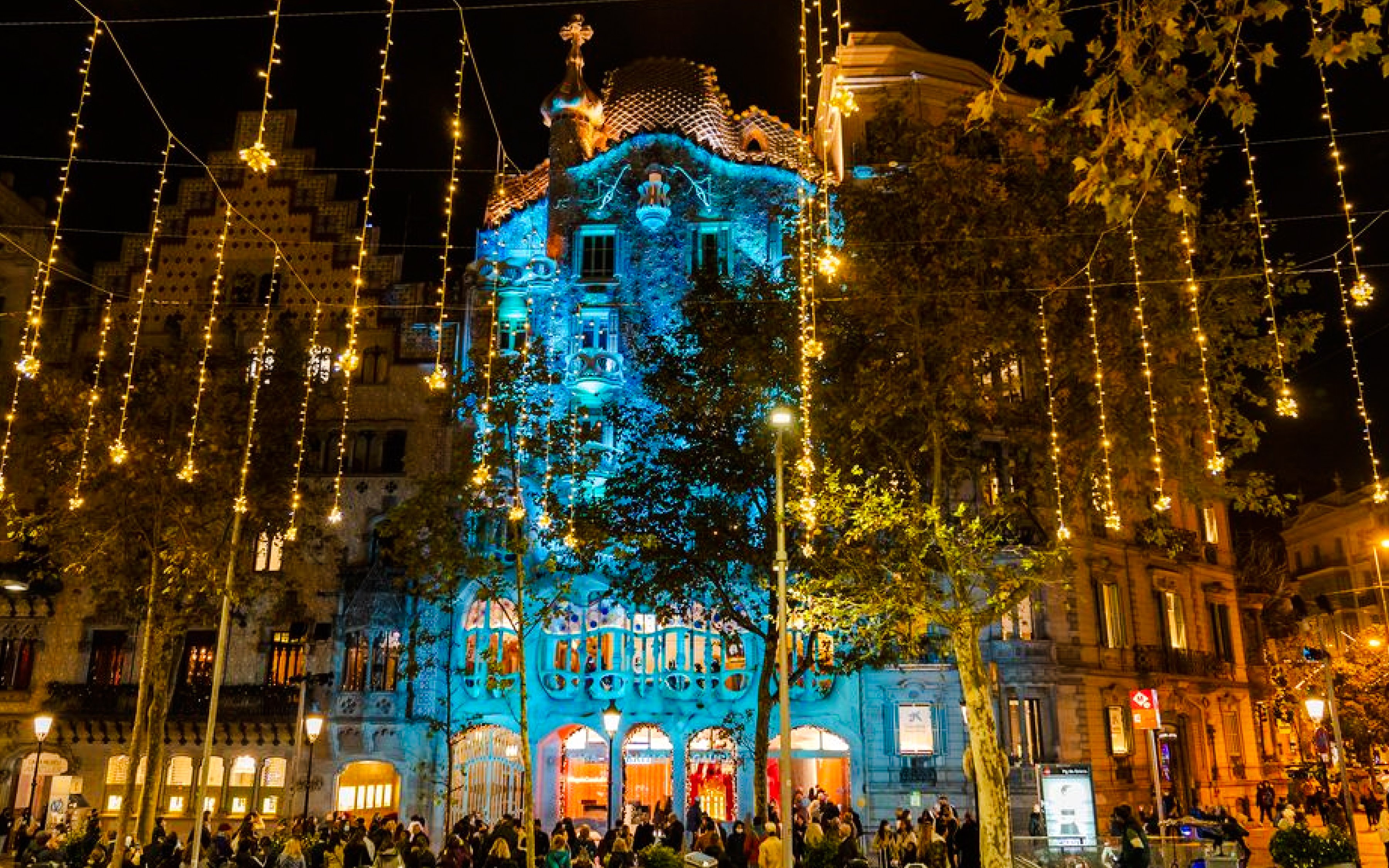 Casa Batlló illuminated with Christmas lights during a Barcelona Christmas tour.