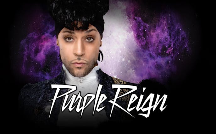 Performer in Purple Reign show with cosmic purple background