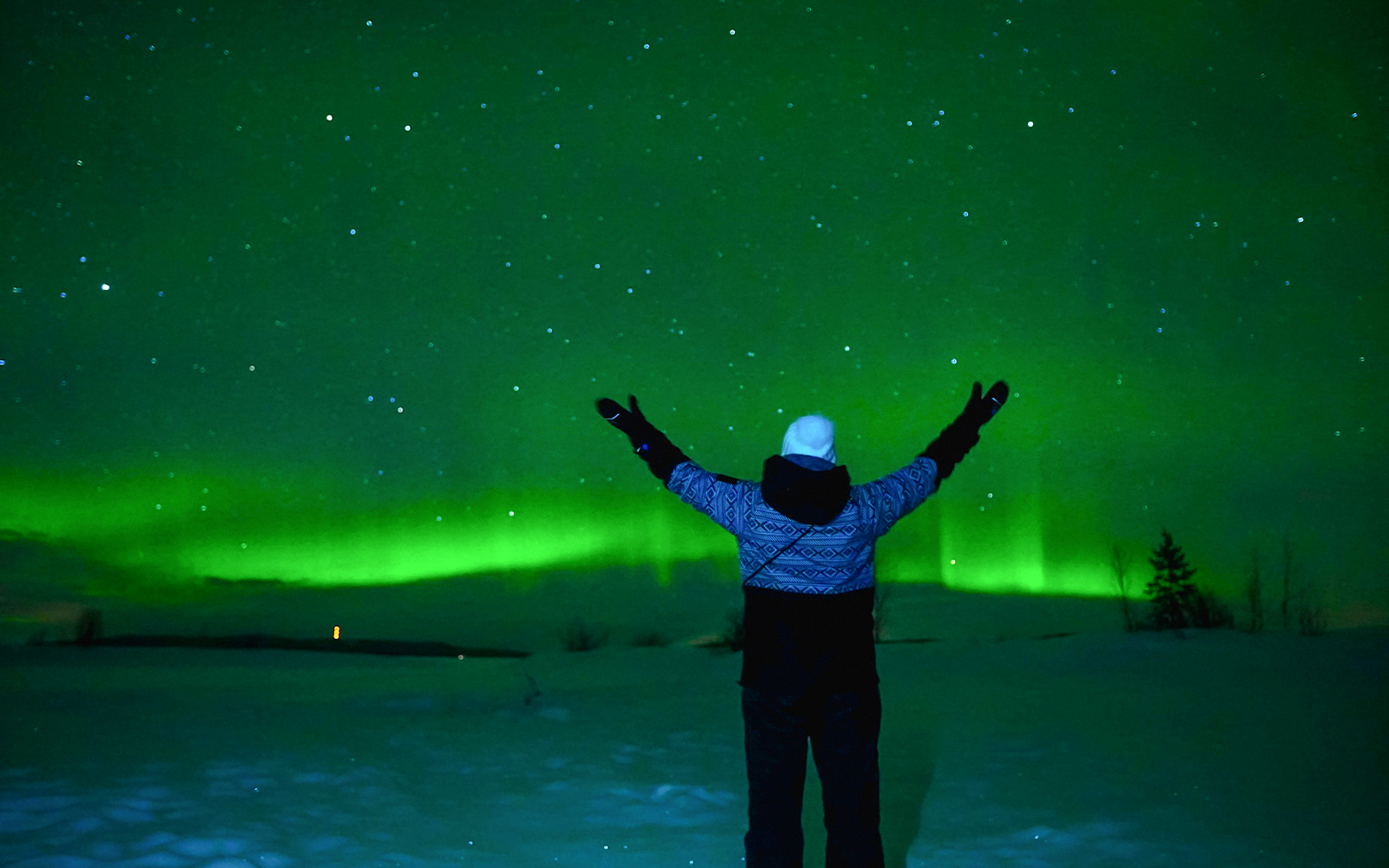 Northern Lights over Tromsø with photographer capturing aurora borealis in Norway.