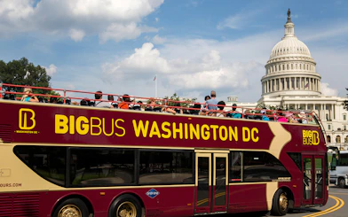 Big Bus tour in Washington DC passing by the US Capitol building.