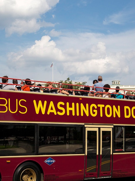 Big Bus tour in Washington DC passing by the US Capitol building.