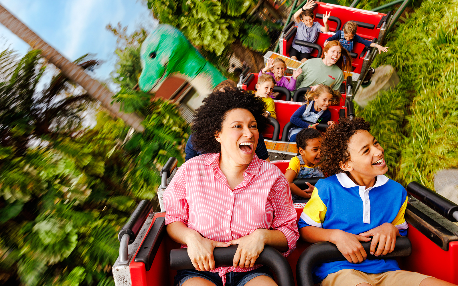 Family enjoying a rollercoaster ride at LEGOLAND® California.