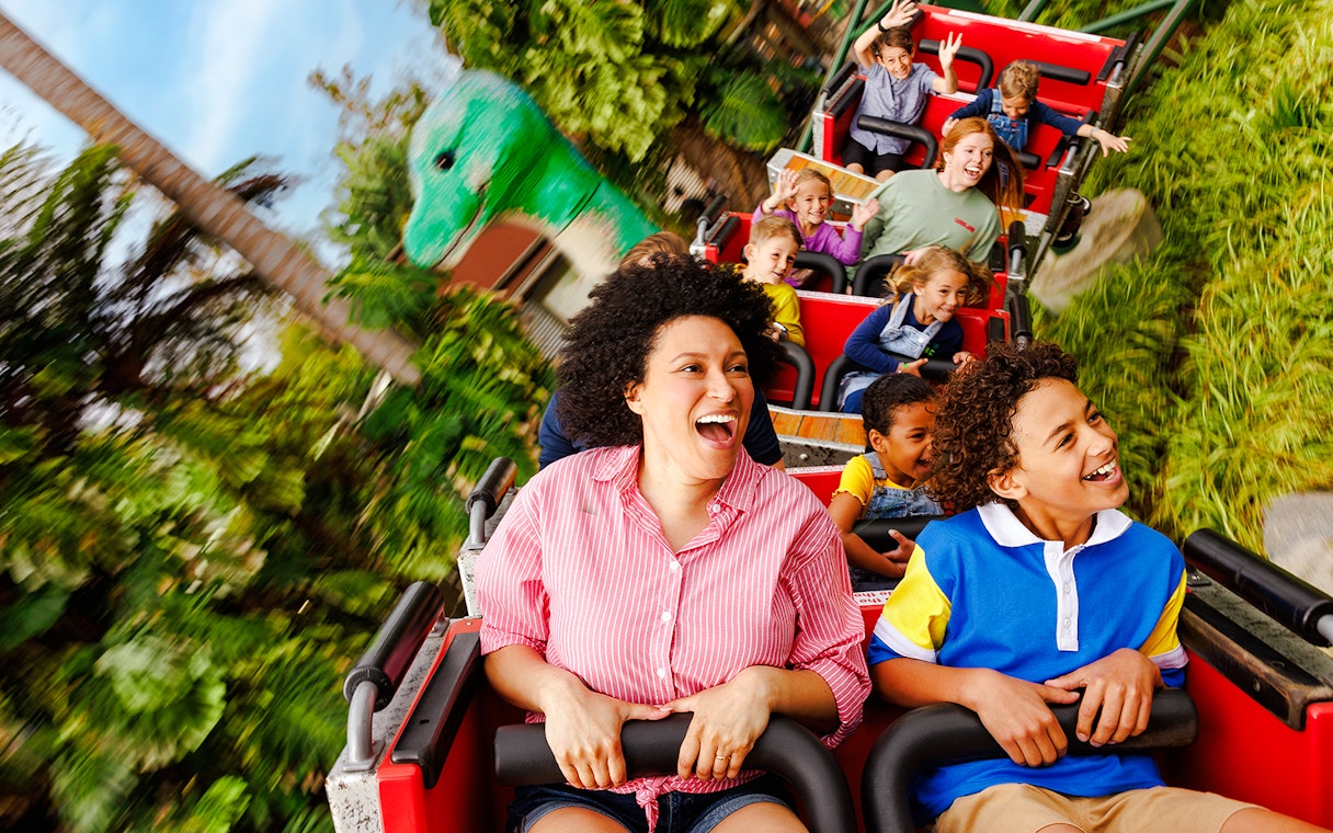 Family enjoying a rollercoaster ride at LEGOLAND® California.
