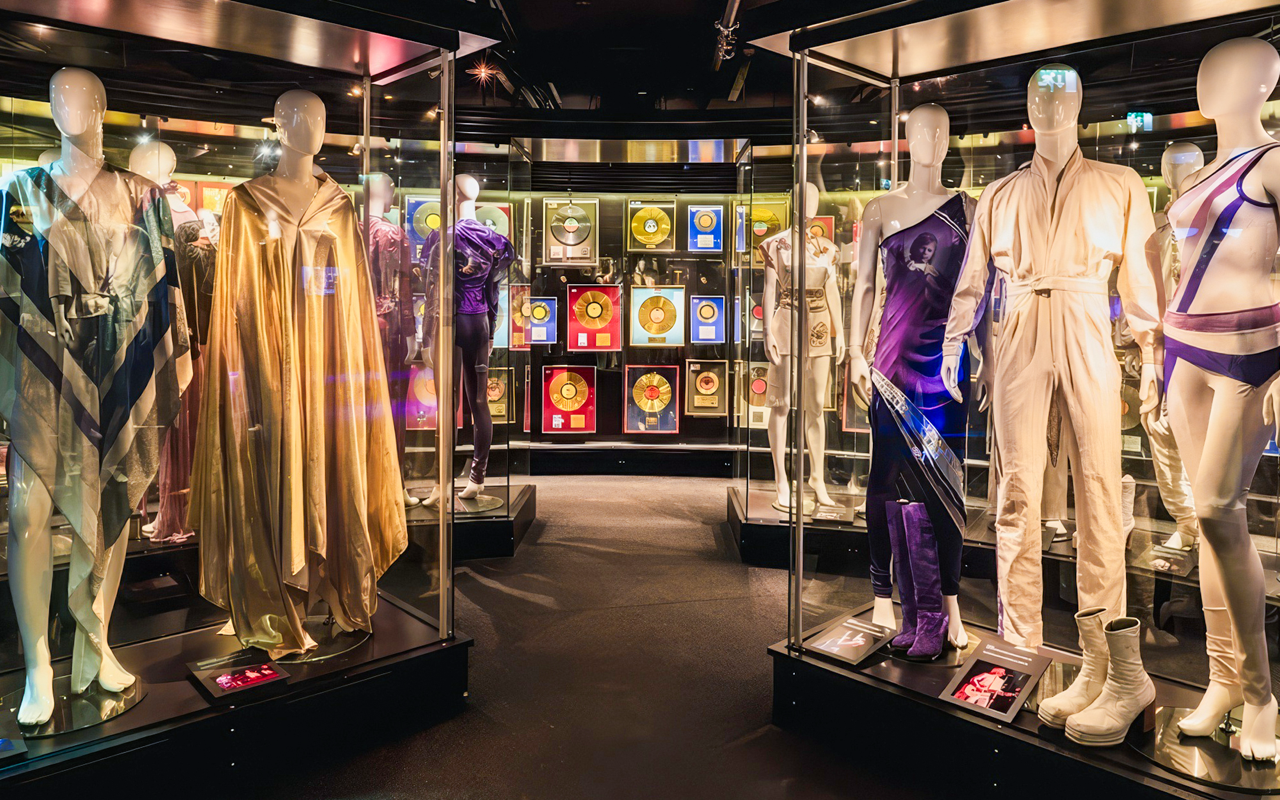 Costumes and gold records on display at ABBA Museum in Stockholm, Sweden.