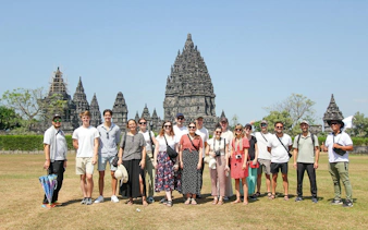 Tour group in front of Prambanan Temple, Yogyakarta, Indonesia.