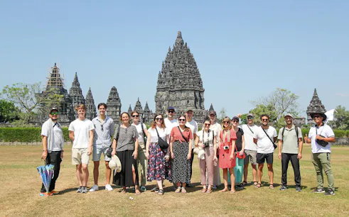 Tour group in front of Prambanan Temple, Yogyakarta, Indonesia.