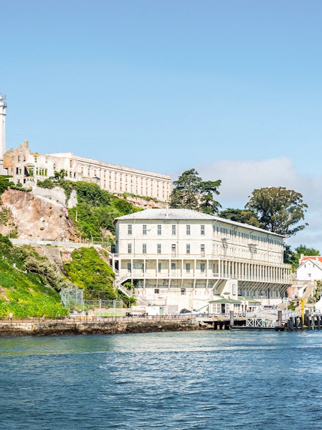 Alcatraz Island with historic prison buildings viewed from San Francisco Bay.