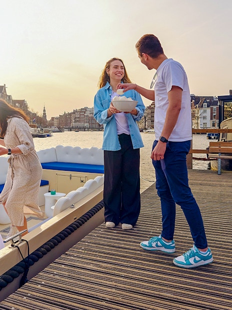 Guests enjoying the Cloud Boat Cruise in Amsterdam canal.
