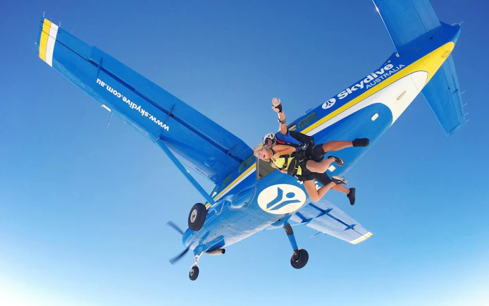 Tandem skydive jump from plane over Airlie Beach, Australia.