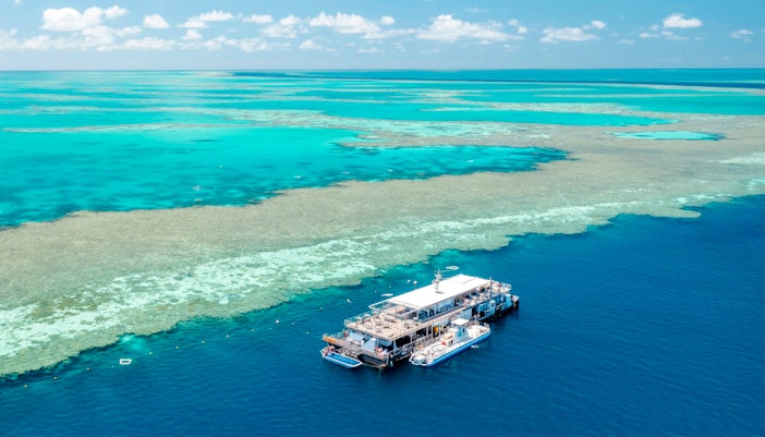 Pontoon floating on the Great Barrier Reef's turquoise waters, Australia.