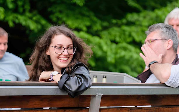 Guests enjoying Auwald scenery during motorboat tour in Leipzig.