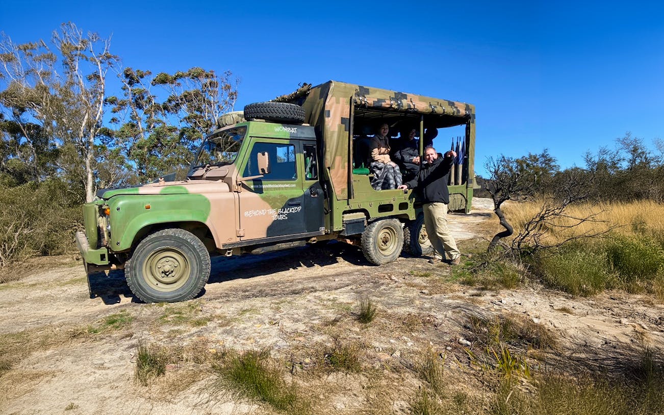 Army truck with tourists on a guided tour in Blue Mountains, Australia.