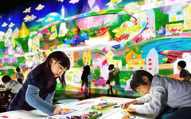 Children engaging in interactive art activities at teamLab Future Park.