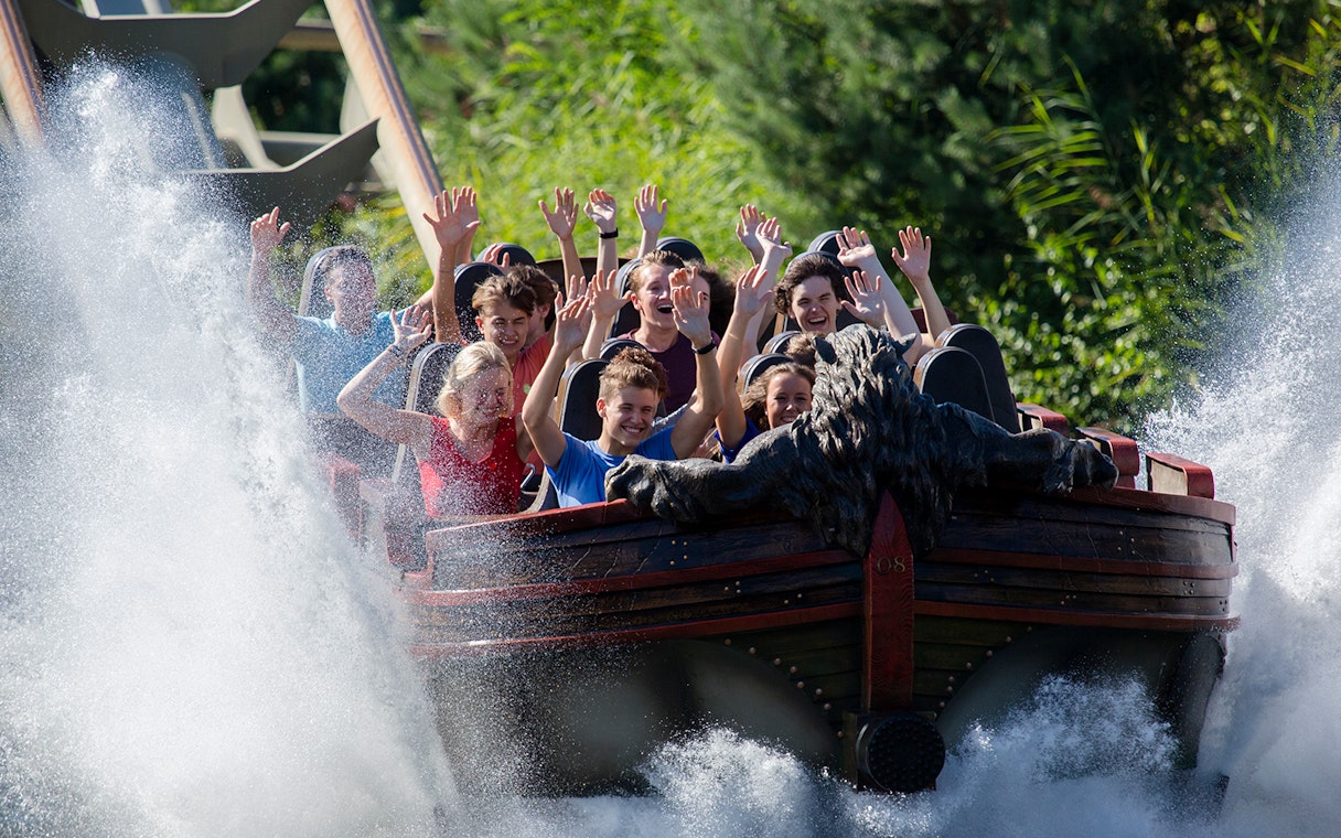 Visitors enjoying a water ride at Efteling theme park near Amsterdam.