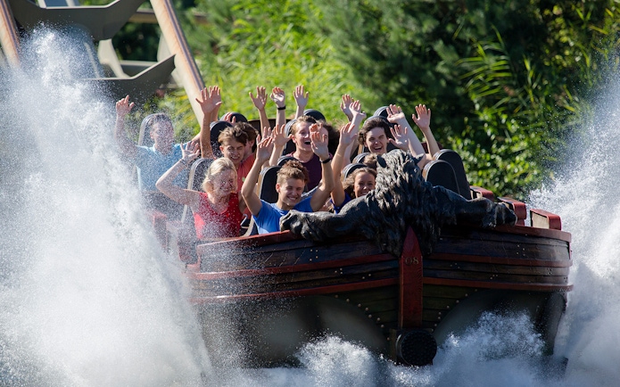 Visitors enjoying a water ride at Efteling theme park near Amsterdam.