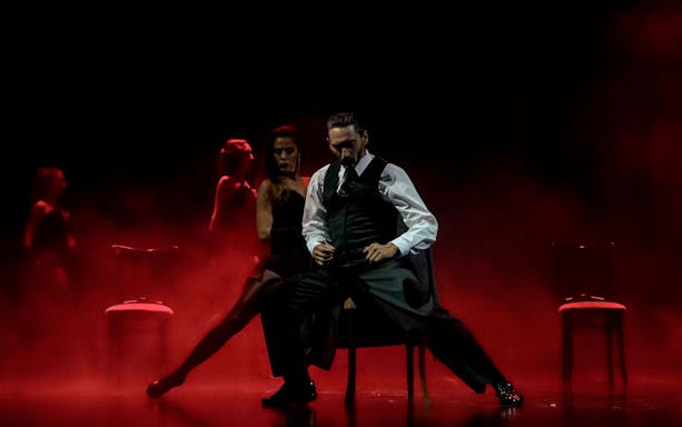 Tango dancers performing at Mansión Tango Show in Buenos Aires, Argentina.