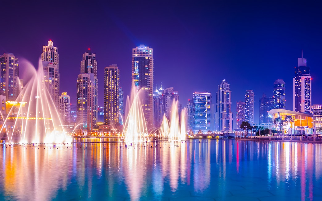 Dancing water fountain show with Dubai skyline during 2-hour luxury dhow dinner cruise.